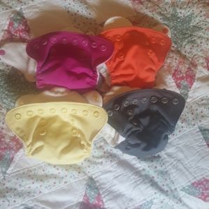 Lot of 4 GroVia newborn cloth diapers